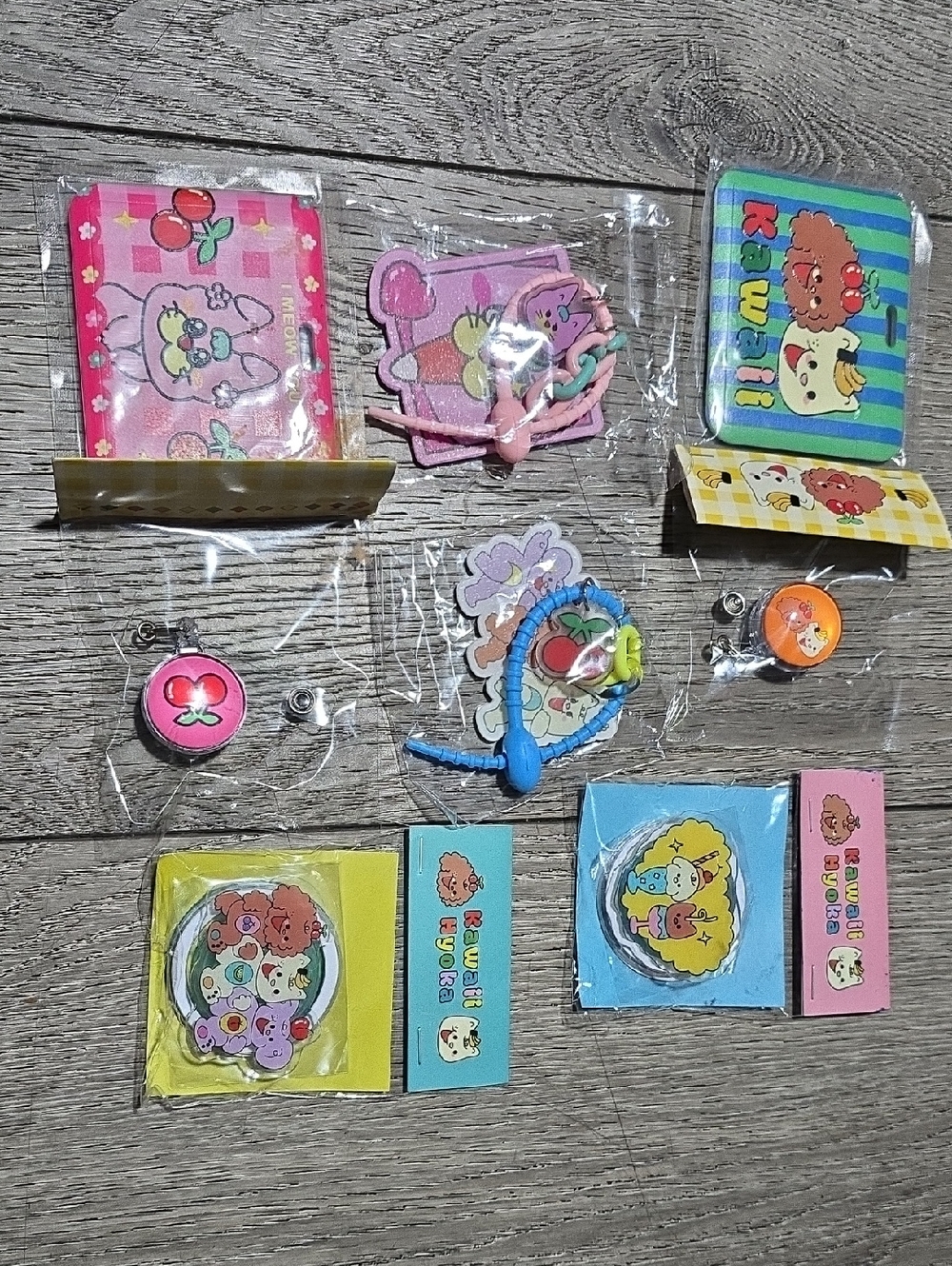 Kawaii Character assorted badge holders, phone sockets, and keychain bundle.